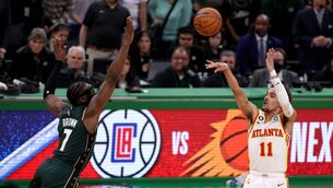 <p>CLUTCH: Trae Young of the Atlanta Hawks shoots the game winning 29-foot three point basket against Jaylen Brown of the Boston Celtics during the fourth quarter in game five of the Eastern Conference First Round Playoffs at TD Garden in Boston, Massachusetts. Pic: Maddie Meyer/Getty Images</p>