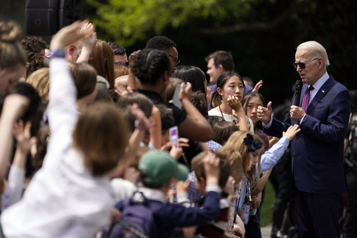 President Joe Biden speaks to the children who gathered on the grounds of the White House. Picture: AP Photo/Evan Vucci
