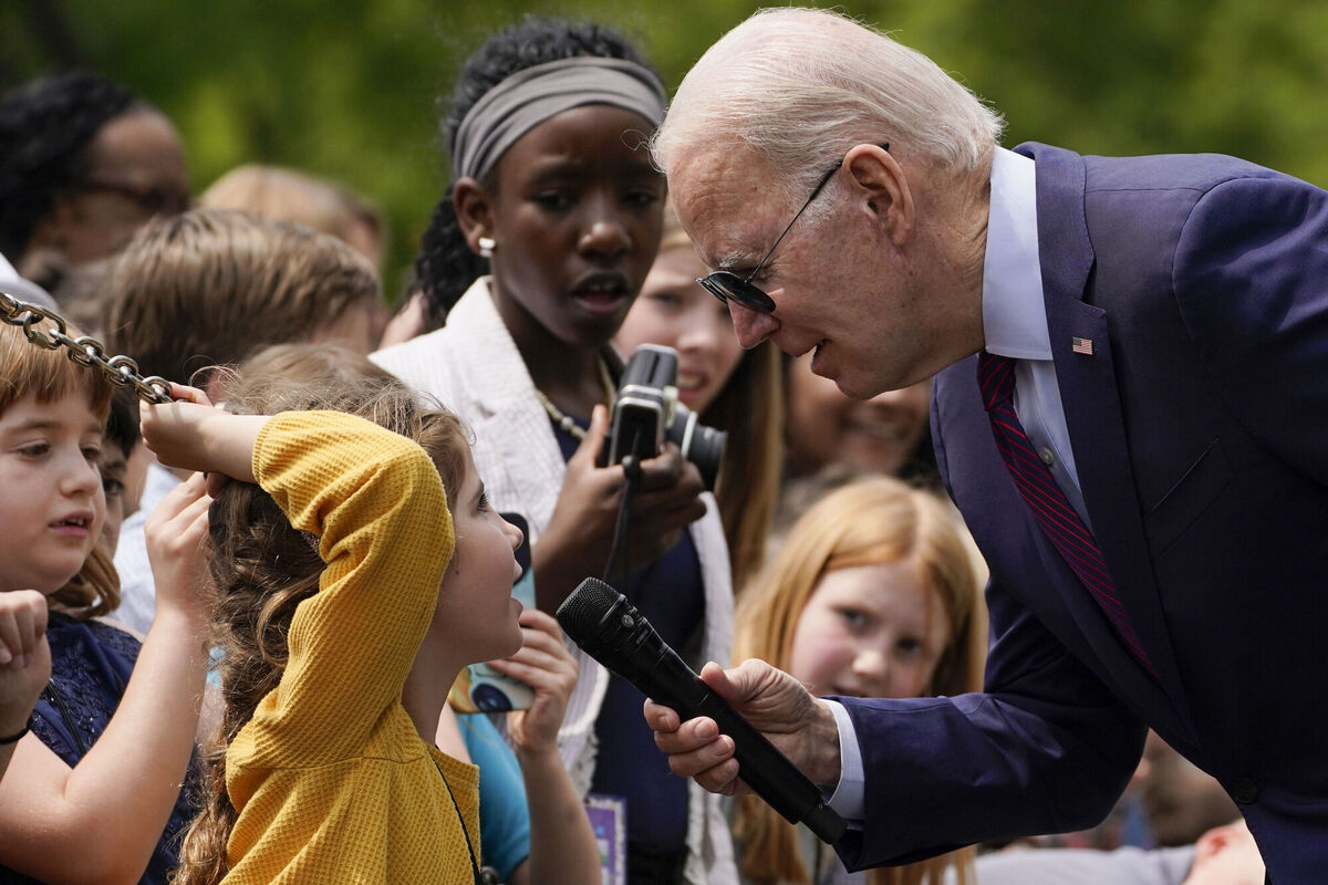 President Joe Biden listens as a child speaks at 'Take Your Child to Work Day' in Washington DC. Picture: AP Photo/Evan Vucci