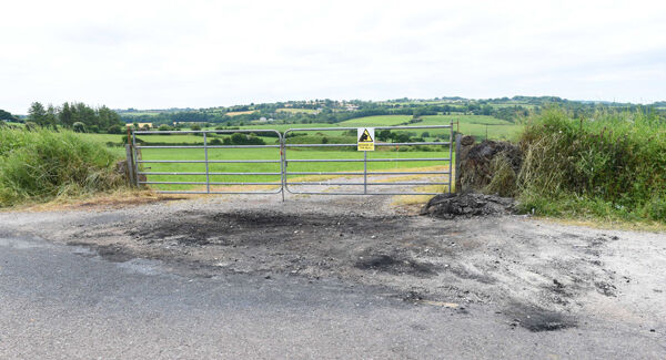 The scene after the removal of a burnt-out vehicle believed to be linked to the attack and murder. Picture: Larry Cummins.