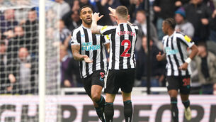 <p>Newcastle United's Callum Wilson (left) celebrates scoring their side's first goal of the game.</p>