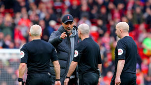 <p>NOT PLEASED: Liverpool manager Jurgen Klopp speaks to match officials at the end of the Premier League match at Anfield. Pic: Peter Byrne/PA Wire.</p>