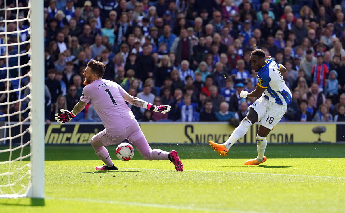 Brighton and Hove Albion's Danny Welbeck shoots towards goal as Wolverhampton Wanderers goalkeeper Jose Sa saves.