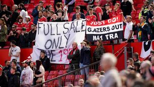 <p>PROTESTS: Manchester United fans with Glazers Out banners in the stands during the Premier League match at Old Trafford, Manchester. Pic: PA</p>