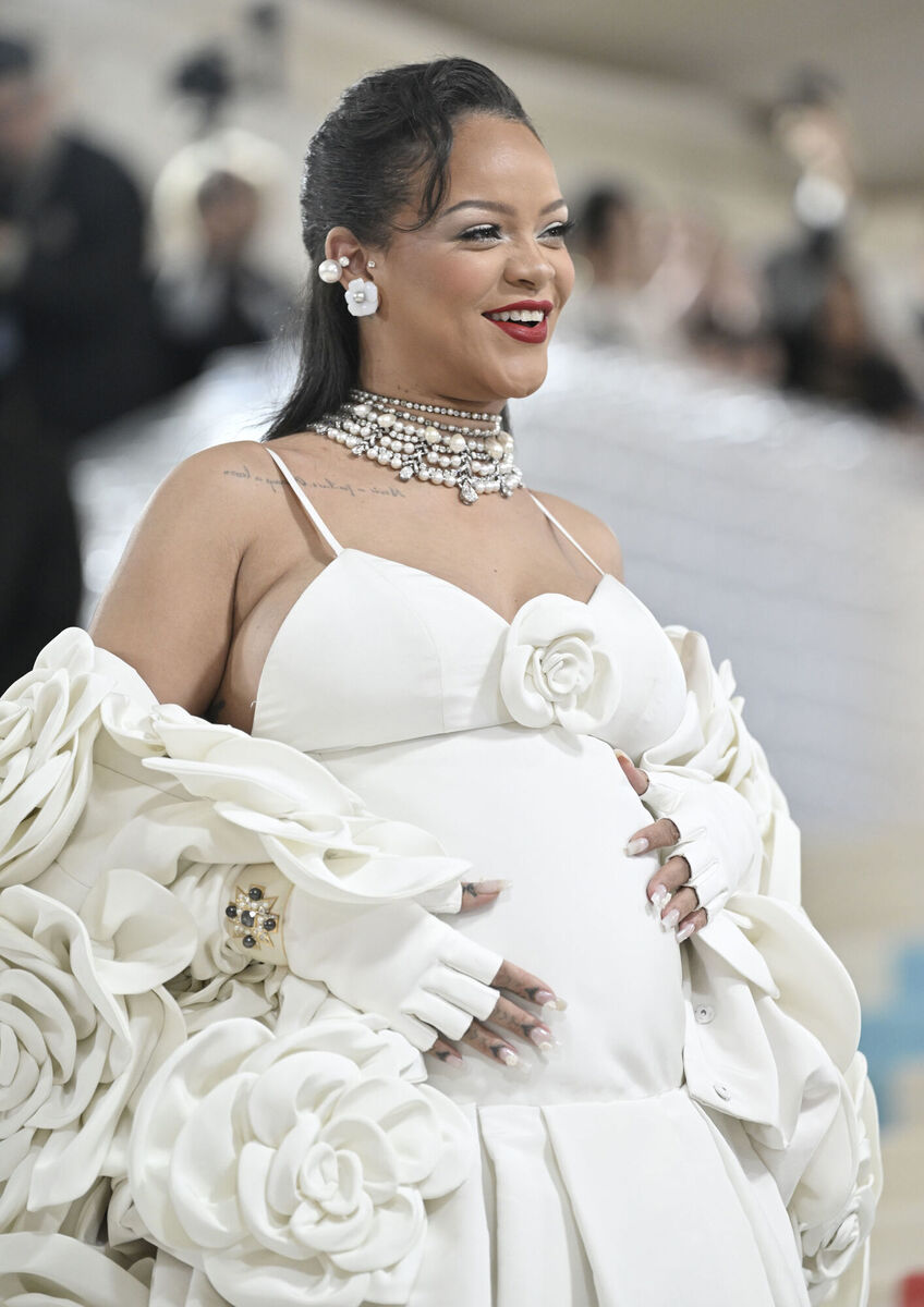 BUMP UP THE VOLUME: Swathed in a voluminous Valentino gown, Rihanna revealed at the Met Gala that she is pregnant — as did tennis star Serena Williams and model Karlie Kloss. Picture: Evan Agostini/Invision/AP BUMP UP THE VOLUME: Swathed in a voluminous Valentino gown, Rihanna revealed at the Met Gala that she is pregnant — as did tennis star Serena Williams and model Karlie Kloss. Picture: Evan Agostini/Invision/AP