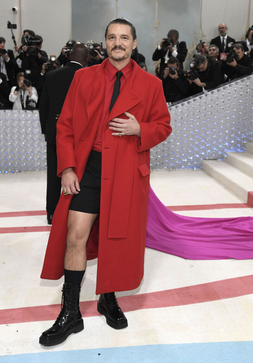 SIMPLY RED: Pedro Pascal put on long coat and short pants before trooping to the New York Metropolitan Museum of Art's Costume Institute benefit gala, aka the 'Met Gala'. Picture: Evan Agostini/Invision/AP SIMPLY RED: Pedro Pascal put on long coat and short pants before trooping to the New York Metropolitan Museum of Art's Costume Institute benefit gala, aka the 'Met Gala'. Picture: Evan Agostini/Invision/AP