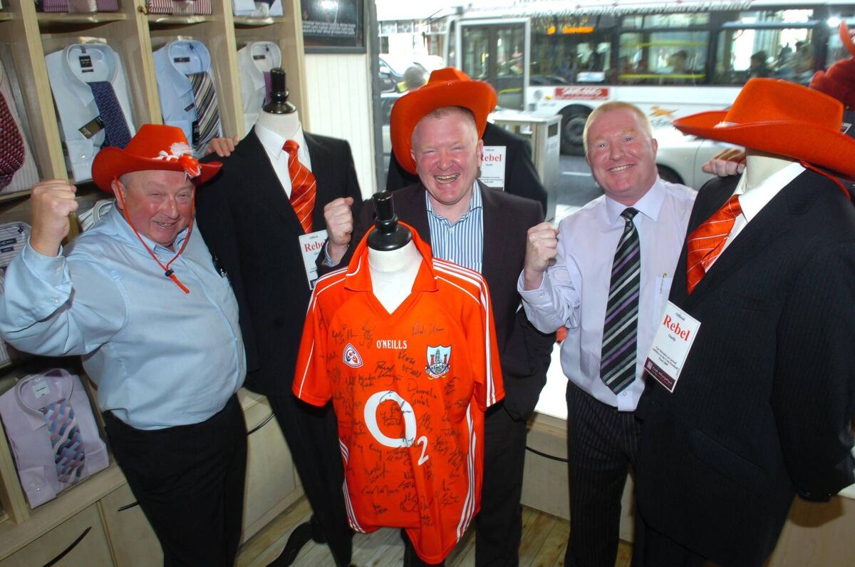 Official Rebel outfitters Donie Walsh, Neil Murphy and Michael Kelly of Con Murphy Menswear Picture: Larry Cummins