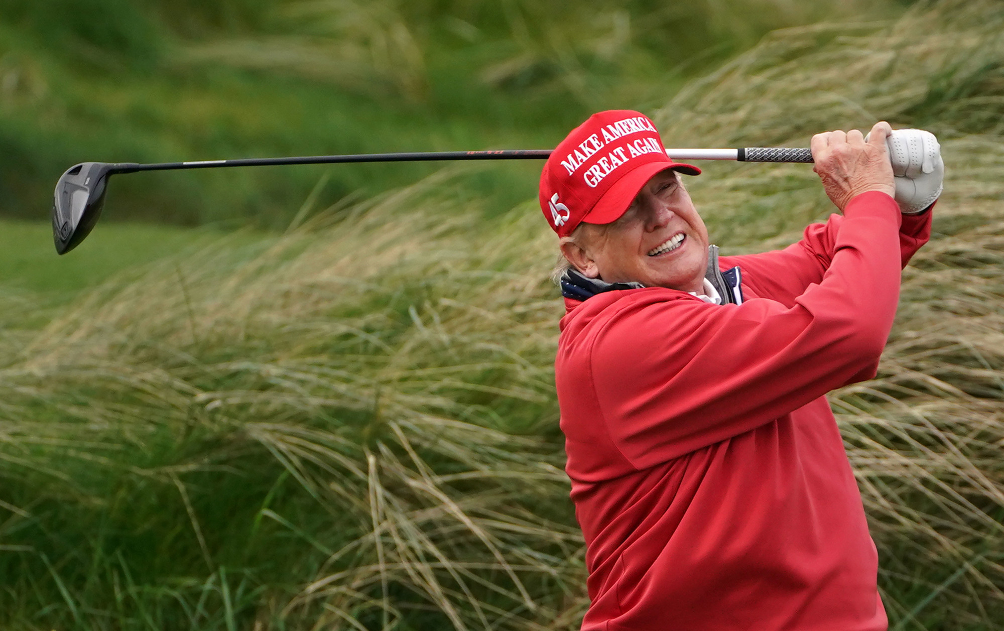 Donald Trump mocks Joe Biden as he takes to the golf course in Doonbeg