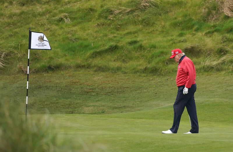 Donald Trump playing golf at Trump International Golf Links & Hotel in Doonbeg. Picture: Brian Lawless/PA Wire Donald Trump playing golf at Trump International Golf Links & Hotel in Doonbeg. Picture: Brian Lawless/PA Wire