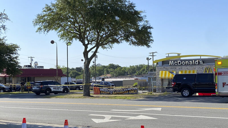 Gunman shoots two relatives and McDonald’s worker before killing himself Gunman shoots two relatives and McDonald’s worker before killing himself