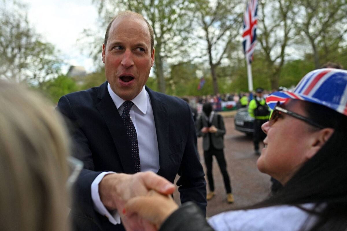 Britain's Prince William speaks with well-wishers on The Mall near to Buckingham Palace in central London. Picture: Sebastian Bozon/AFP