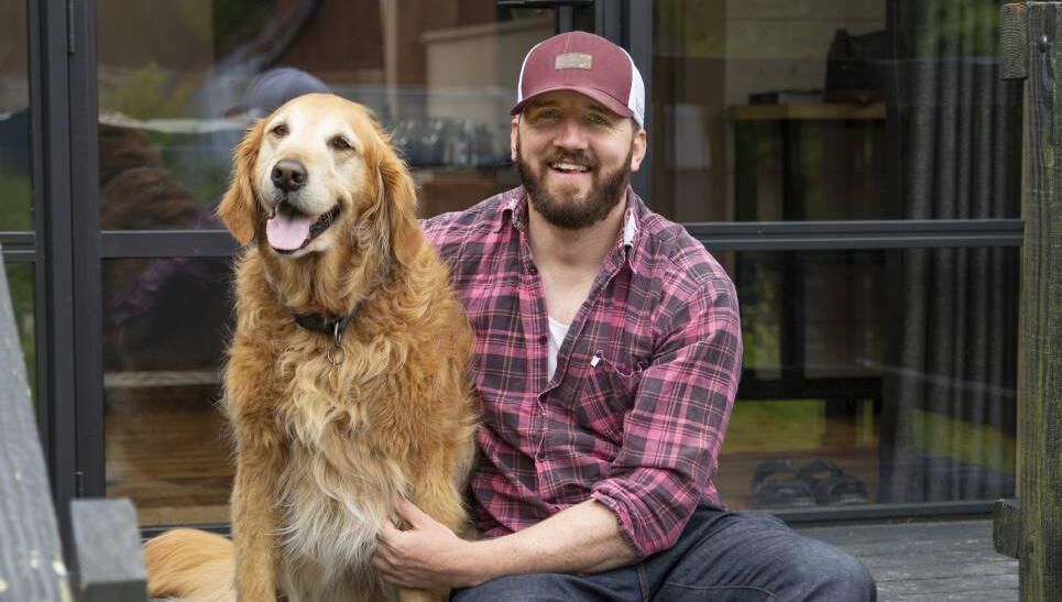 Thom Breathnach, travel writer, with canine assistant Vipp Thom Breathnach, travel writer, with canine assistant Vipp