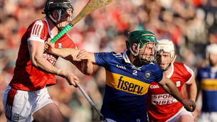 <p>HEAVY HITTING AFFAIR: Cork's Darragh Fitzgibbon with Cathal Barrett of Tipperary. Pic: ©INPHO/Ben Brady</p>