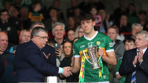 <p>ADAMENT ON PLAYING: Kerry's David Clifford is presented with the Cup. Pic: ©INPHO/Bryan Keane</p>