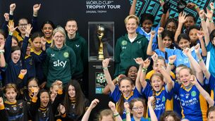 <p>Republic of Ireland manager Vera Pauw, right, former Republic of Ireland international Olivia O'Toole and Republic of Ireland international Abbie Larkin with participants and the FIFA Women’s World Cup trophy during a grassroots girls schools blitz, part of the FIFA Women’s World Cup Trophy Tour in Dublin, at Irishtown Stadium in Dublin. Pic: Stephen McCarthy/Sportsfile</p>