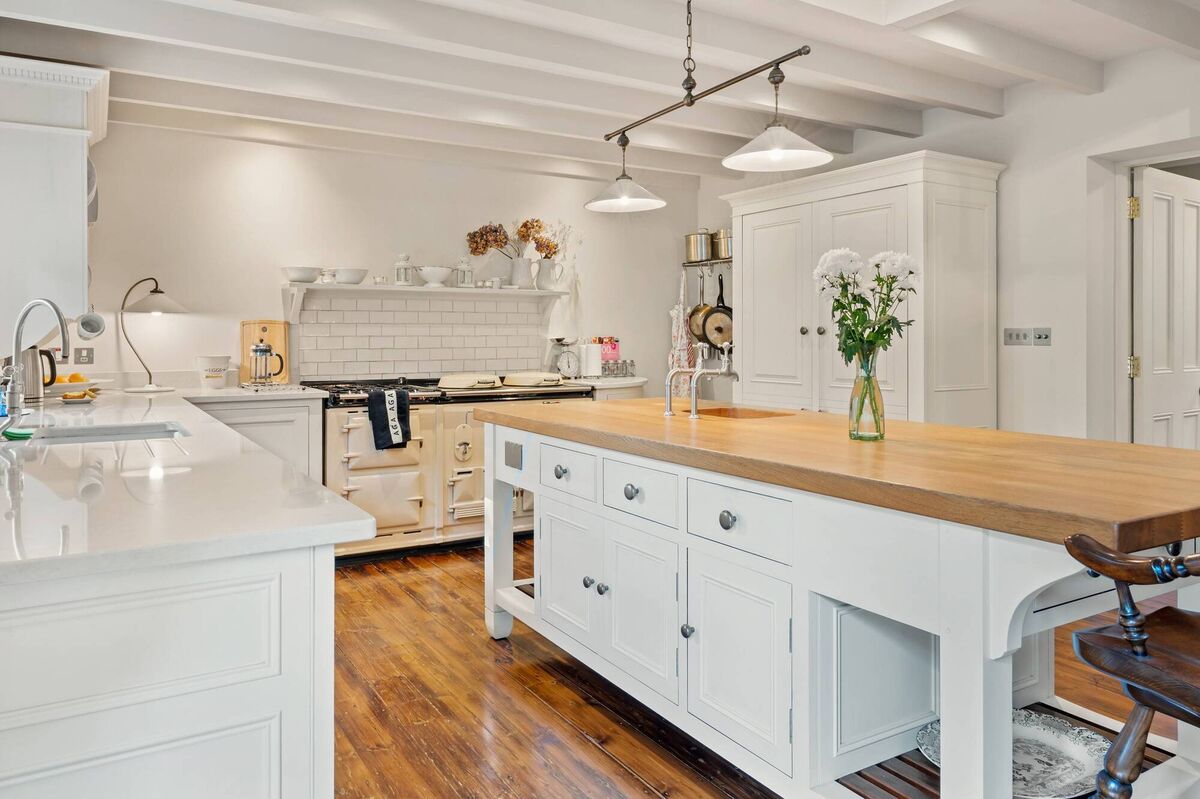 Kitchen by Chalon with quartz and timber tops, plus obligatory Aga, which is dual fuel