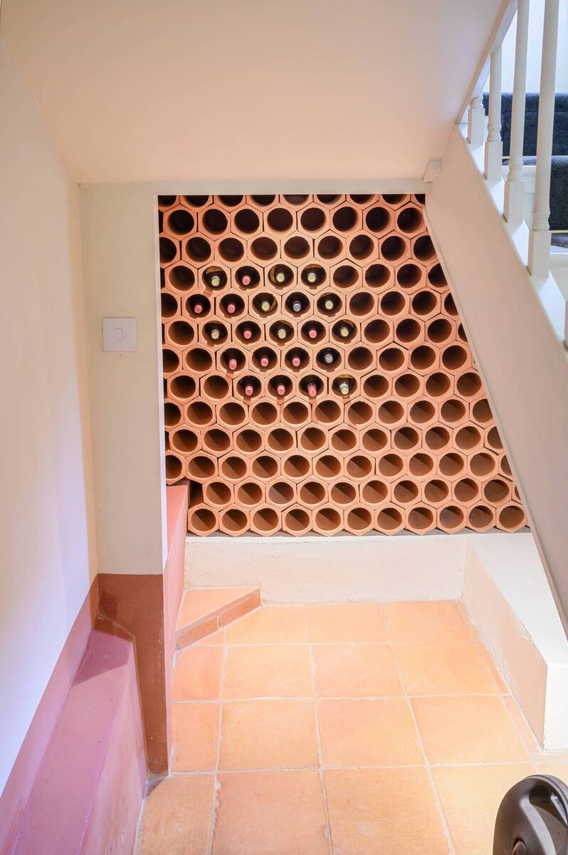 Wine rack made of clay pipes