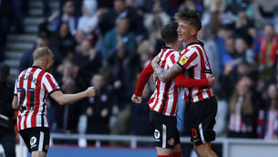 <p>LOOKING UP: Trai Hume celebrates his winner (Will Matthews/PA)</p>
