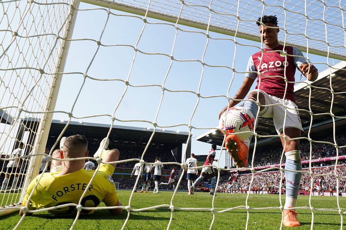 Aston Villa's Ollie Watkins collects the ball from the back of the net after team-mate Douglas Luiz scores their side's second goal of the game past Tottenham Hotspur goalkeeper Fraser Forster during the Premier League match at Villa Park, Birmingham. Picture date: Saturday May 13, 2023. PA Photo. See PA story SOCCER Villa. Photo credit: Jacob King/PA Wire. Aston Villa's Ollie Watkins collects the ball from the back of the net after team-mate Douglas Luiz scores their side's second goal of the game past Tottenham Hotspur goalkeeper Fraser Forster during the Premier League match at Villa Park, Birmingham. Picture date: Saturday May 13, 2023. PA Photo. See PA story SOCCER Villa. Photo credit: Jacob King/PA Wire.