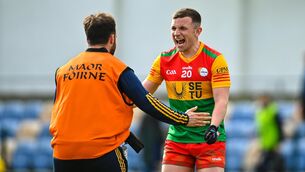 <p>JOB DONE: Aaron Amond of Carlow celebrates with Maor Fóirne, Ronan Joyce after their side's victory in the Tailteann Cup Group 3 Round 1 match against Wicklow at Echelon Park in Aughrim. Pic: Tyler Miller/Sportsfile</p>