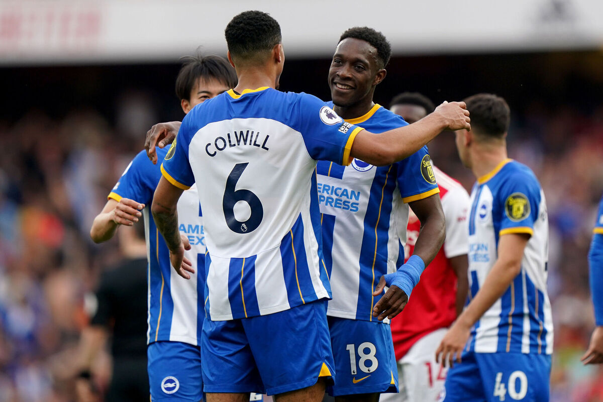 EUROPE BOUND: Brighton and Hove Albion’s Danny Welbeck (right) celebrates with Brighton and Hove Albion’s Levi Colwill (centre) following the Premier League match at the Emirates Stadium, London. Picture date: Sunday May 14, 2023. PA Photo. See PA story SOCCER Arsenal. Photo credit should read: Tim Goode/PA Wire.