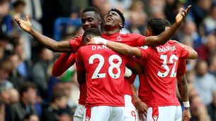 <p>OPENER: Nottingham Forest's Taiwo Awoniyi (third left) celebrates with his team mates after scoring the first goal of the game during the Premier League match at Stamford Bridge. Pic: Nigel French/PA Wire</p>