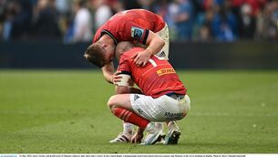 <p>OVERCOME: Jack Crowley and Keith Earls of Munster embrace after their side's victory in the United Rugby Championship semi-final at the Aviva Stadium. Pic: Harry Murphy/Sportsfile</p>