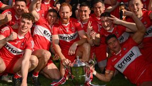 <p>BACK-TO-BACK: Derry captain Conor Glass and teammates celebrate with the Anglo Celt Cup at St Tiernach’s Park in Clones. Pic: Harry Murphy/Sportsfile</p>