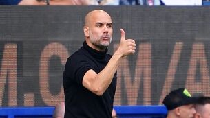 <p>MAKE MINE A TREBLE: Manchester City manager Pep Guardiola is looking forward to a decisive week in their season (Peter Byrne/PA)</p>