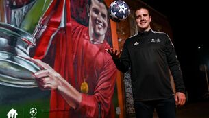 <p>Ireland senior international coach and Just Eat ambassador John O’ Shea is pictured on Dublin’s Camden Row, 20 years on from his iconic nutmeg of Luis Figo. Just Eat are proud sponsors of the UEFA Champions League and have partnered up with John O’Shea to celebrate 20 years since this notable sporting moment. You can be in with a chance of winning tickets to the UEFA Champions League Final by visiting Just Eat's John O’Shea mural on Camden Row, Dublin before the 19th of May and scanning the QR code. For more information, visit just-eat.ie/info/UCL-final-comp-terms-conditions. Photo by David Fitzgerald/Sportsfile</p>