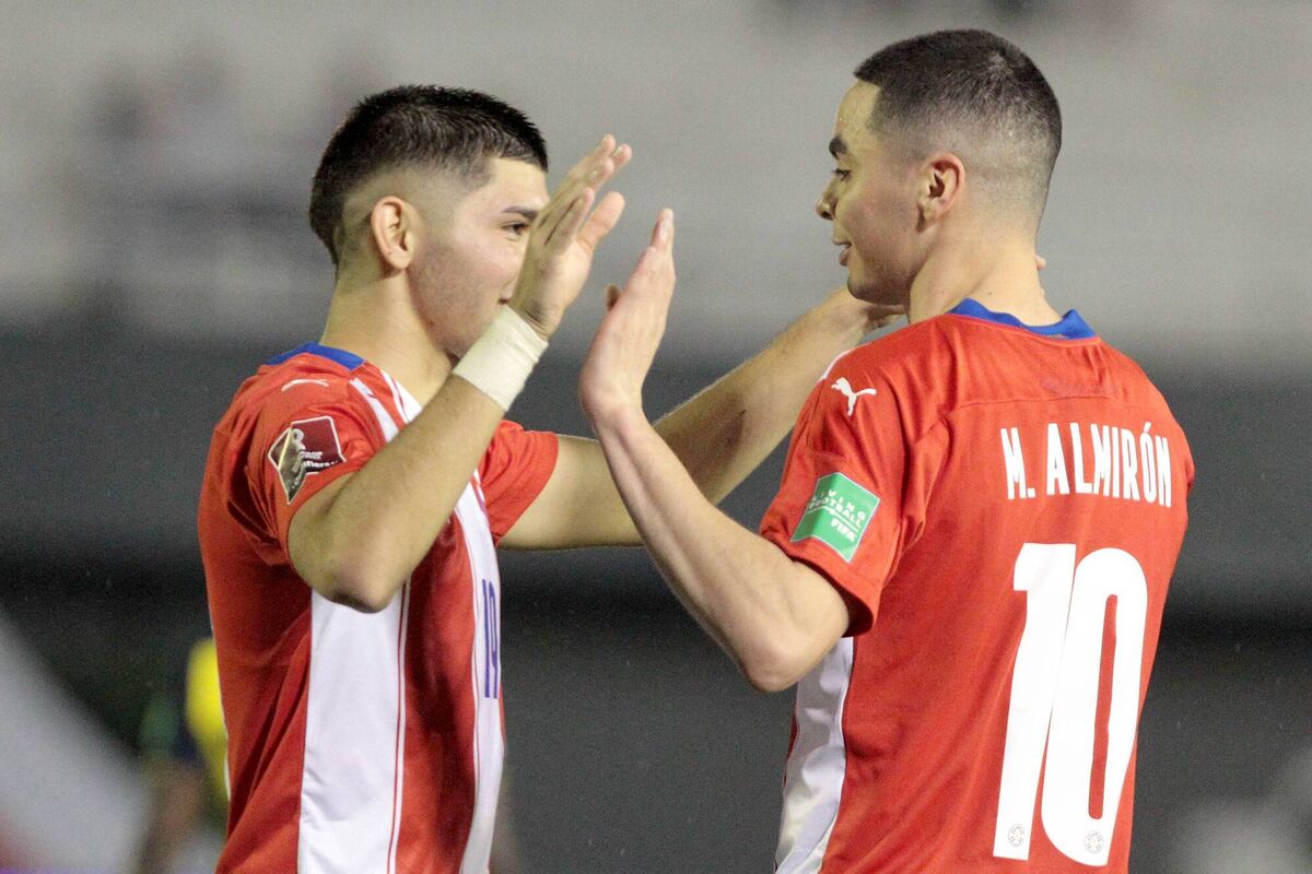 Miguel Almirón (right) celebrates with Julio Enciso after scoring for Paraguay against Ecuador in March 2022. Pic: Christian Alvarenga/Getty Images