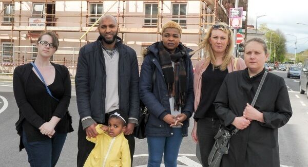 Solidarity councillor Fiona Ryan, left, with Abubacarr and Mariama Barry, Fernanda Bartolomeu, Aimee O’Riordan and Dorota Okon, who are among the residents fighting eviction from Leeside apartments