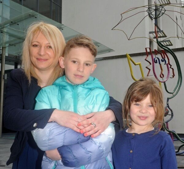 Kacper Ciolek with his mother Luiza and sister Nicola.