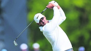 <p>AMBITIONS: Brooks Koepka plays his shot from the 12th tee during the first round of the US PGA Championship at Oak Hill. The American, who now plays on the LIV Tour, said ‘it would be awesome to represent the United States’ in September’s Ryder Cup. <span class="contextmenu emphasis CaptionCredit">Pic: Michael Reaves/Getty Images</span>
            </p>