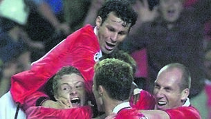 <p>FAIRYTALE FINALE: Super-sub Ole Gunnar Solskjaer is surrounded by his jubilant team-mates after scoring Man United’s last-gasp winner in the 1999 Champions League final.<span class="contextmenu emphasis CaptionCredit"> Pic: Eric Cabanis/AFP via Getty Images</span>
            </p>