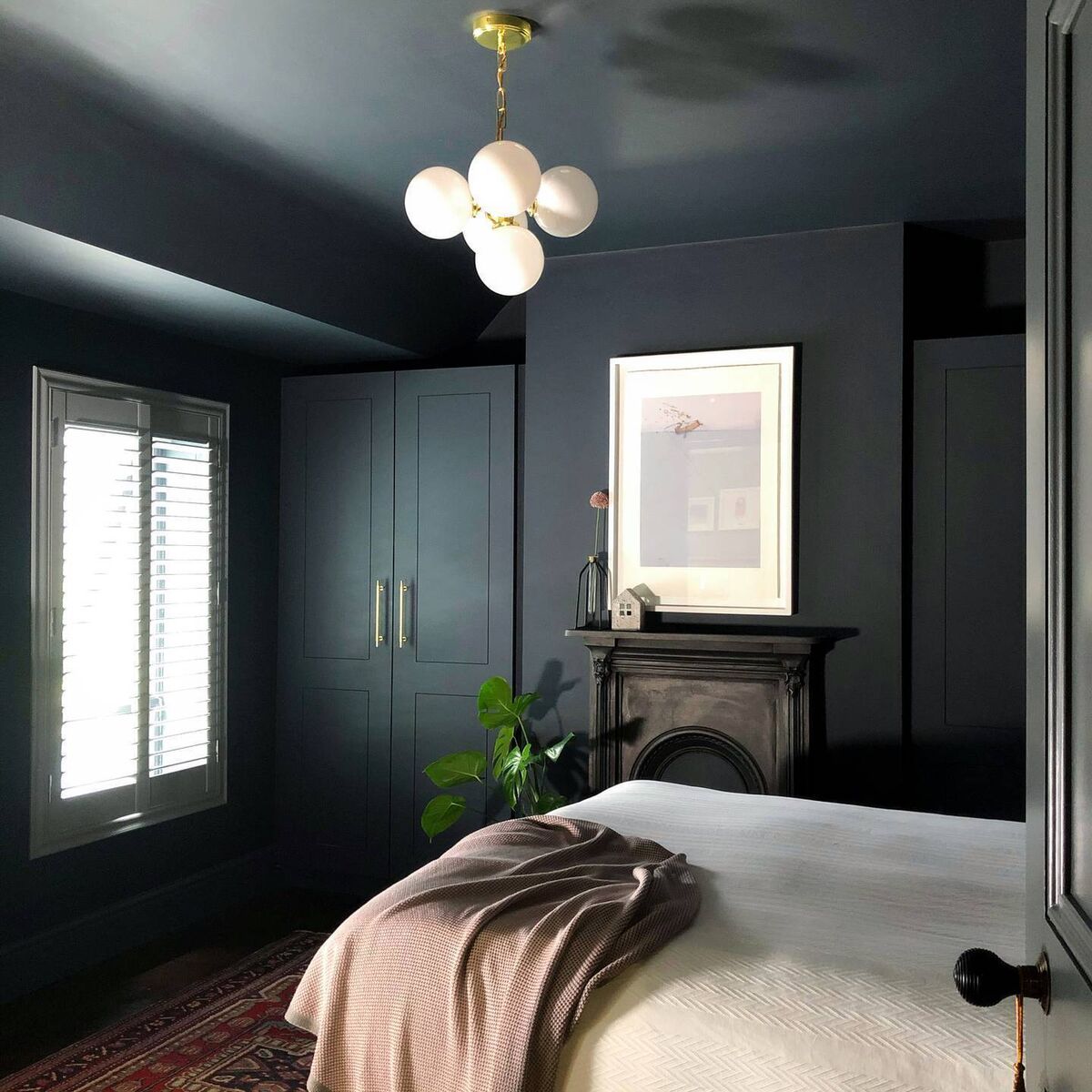 The master bedroom was dark and not a great space for reading or relaxing in before the makeover. 