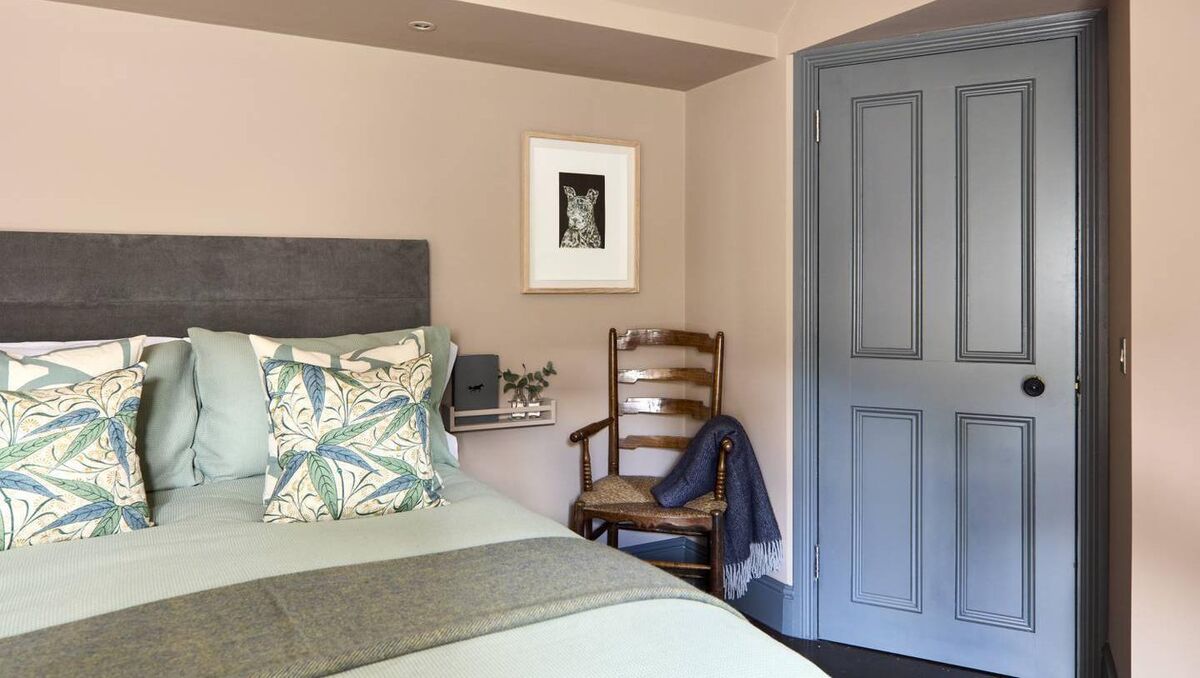 Darran says he's thrilled with how the colours compliment each other in the bedroom. 