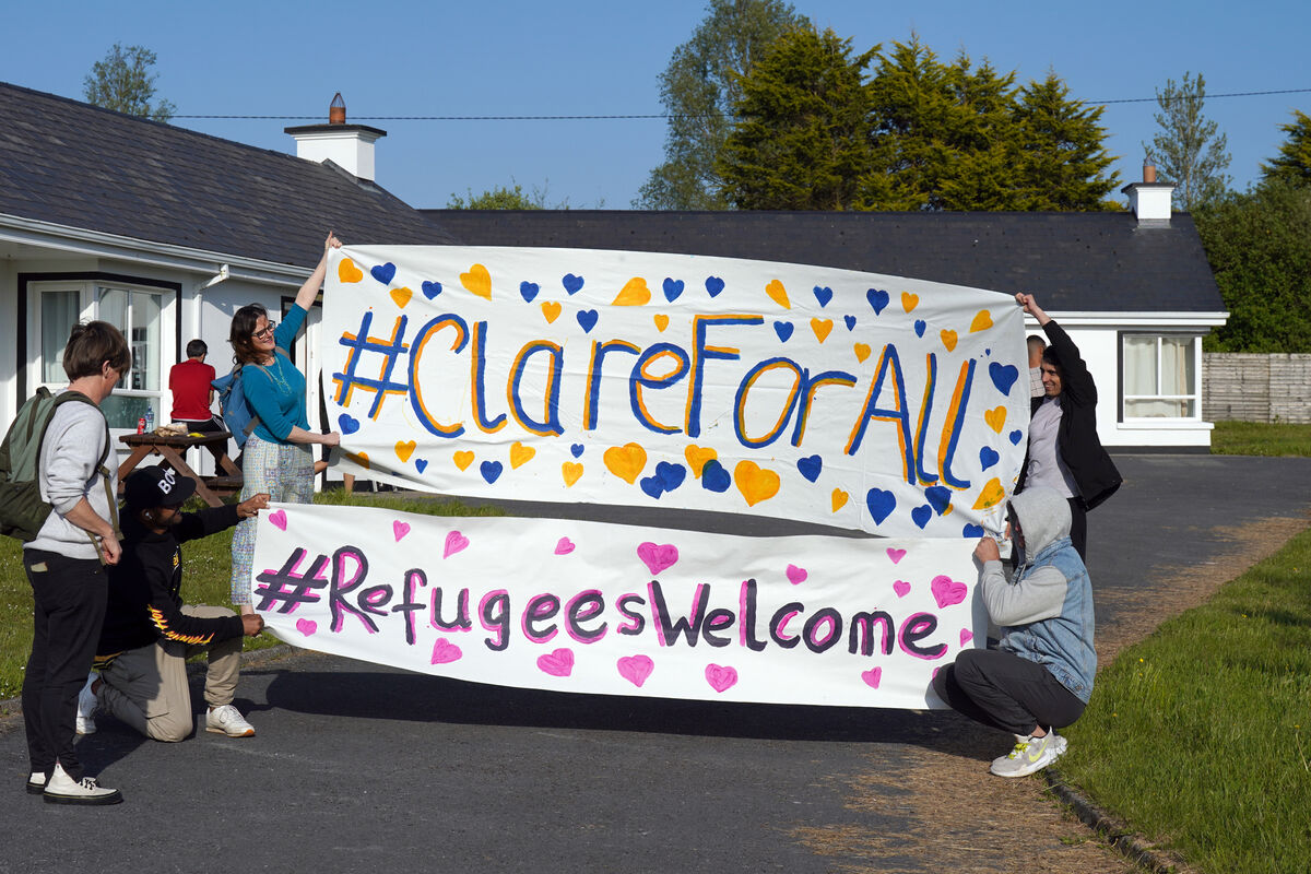 Local residents with asylum seekers in Inch, Co Clare.