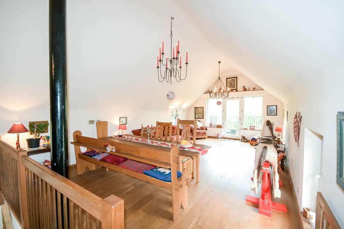 Upside down, and inside out: first floor living room has access to a raised outdoor area at one gable end