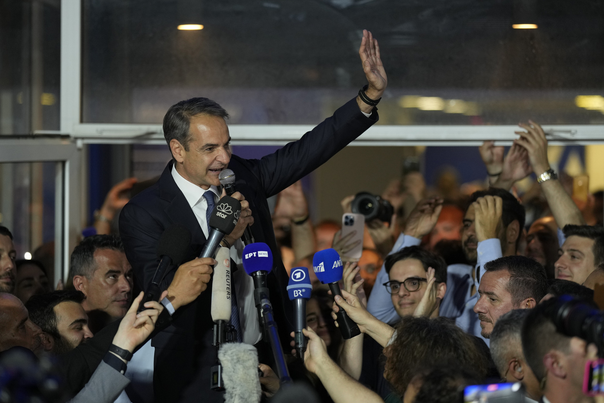 Greek prime minister to seek outright majority after huge election lead