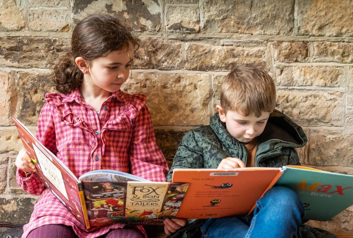 Avid readers Caitlín and Jamie Russell launching last month's Towers and Tales Children's Book Festival (TowersAndTalesFestival.ie) in Lismore, Co Waterford. File picture. John Allen