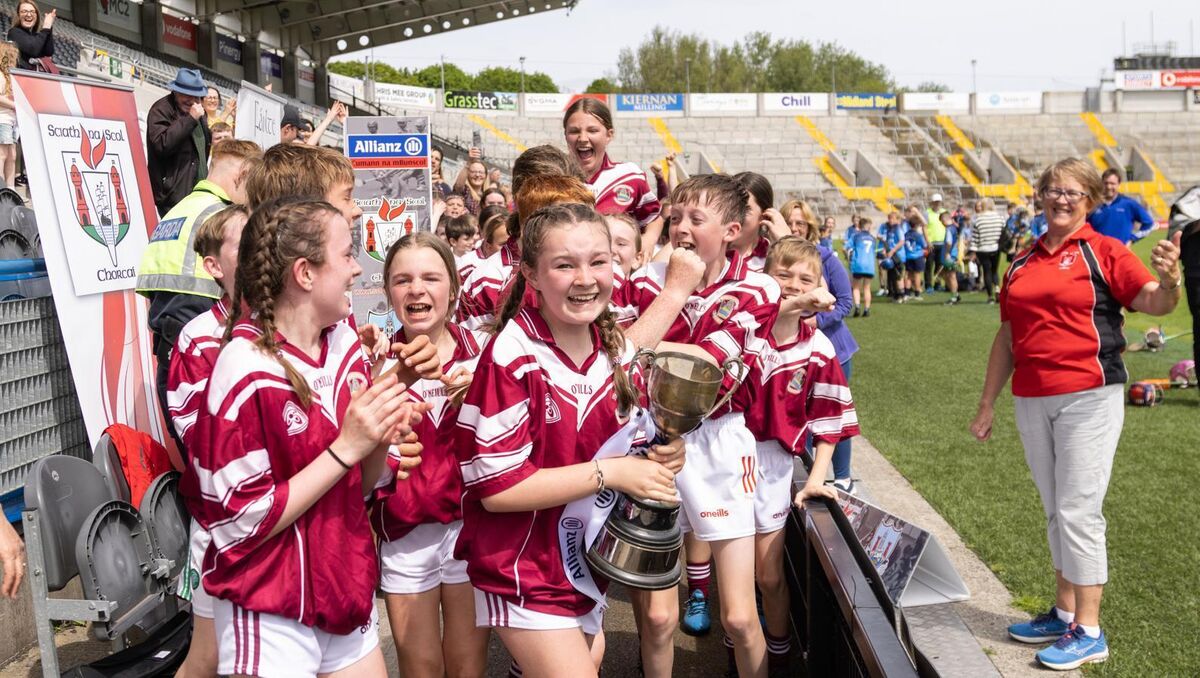  Anna O'Connell, Dripsey celebrates with her team after their victory over Kilbonane in their H5 Allianz Sciath na Scol final at Páirc Uí Chaoimh.