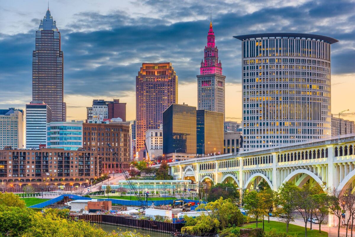 Cleveland, Ohio, USA, on the Cuyahoga River at twilight.