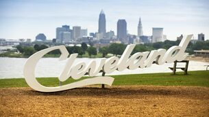 <p>The famous Cleveland sign landmark script overlooking the downtown skyline and Lake Erie Ohio USA.</p>