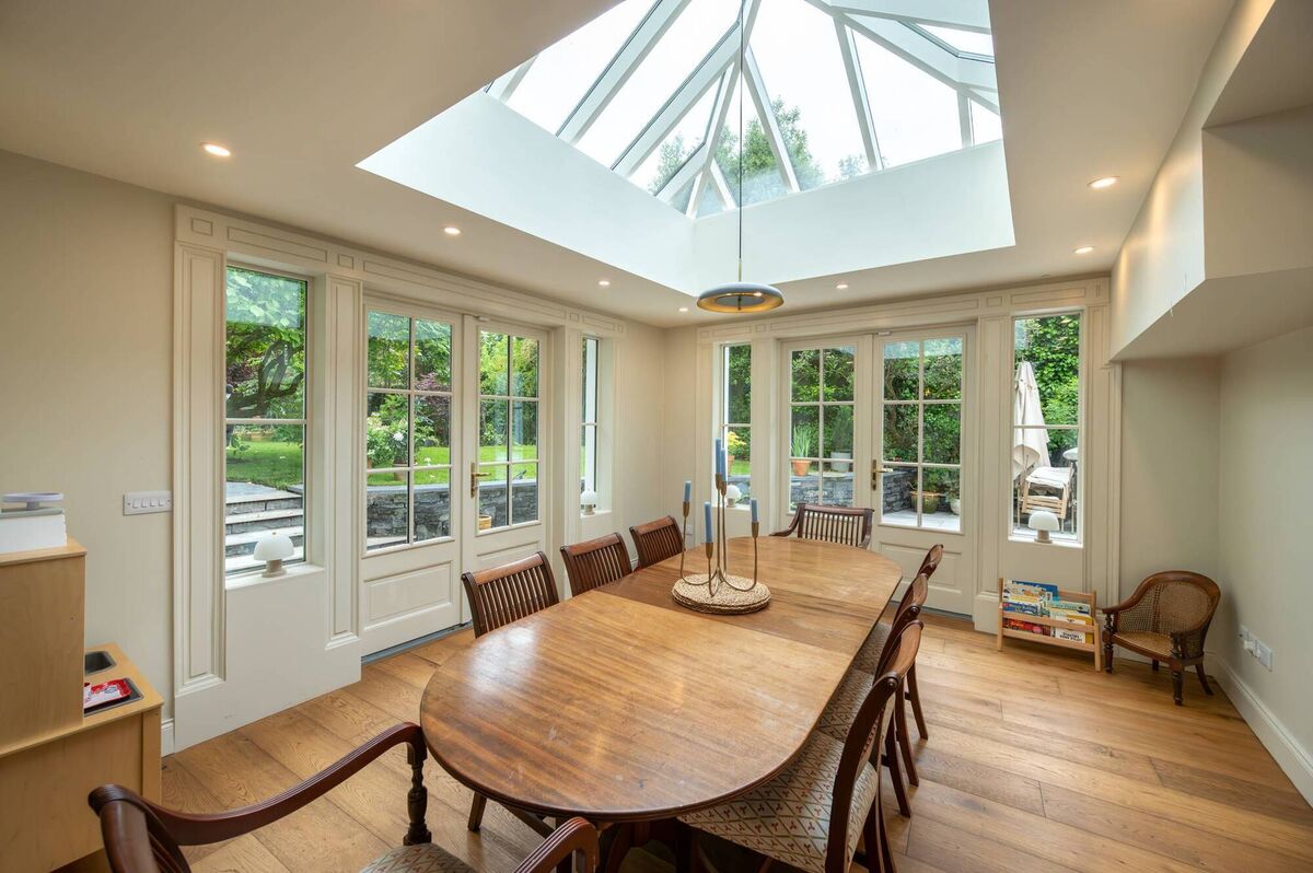 Sunny dining room to the rear with roof light