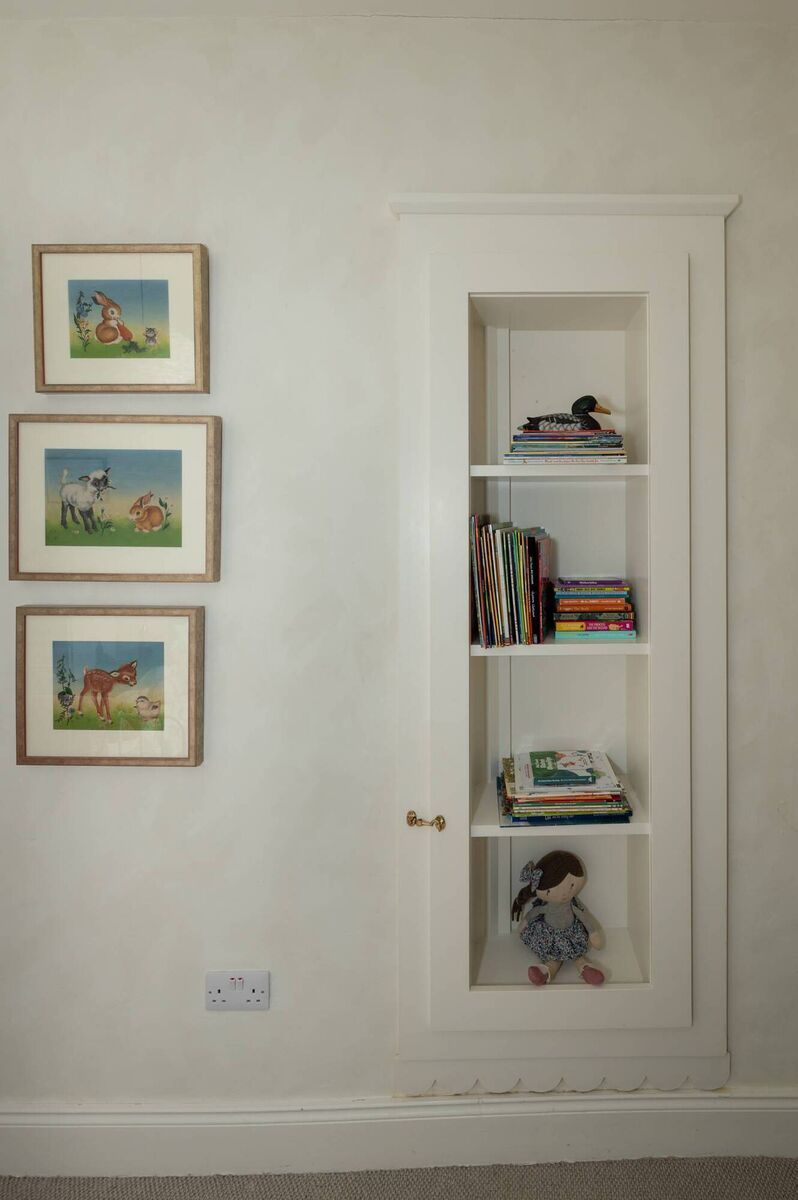 Secret 'passage' behind  hinged bookcases