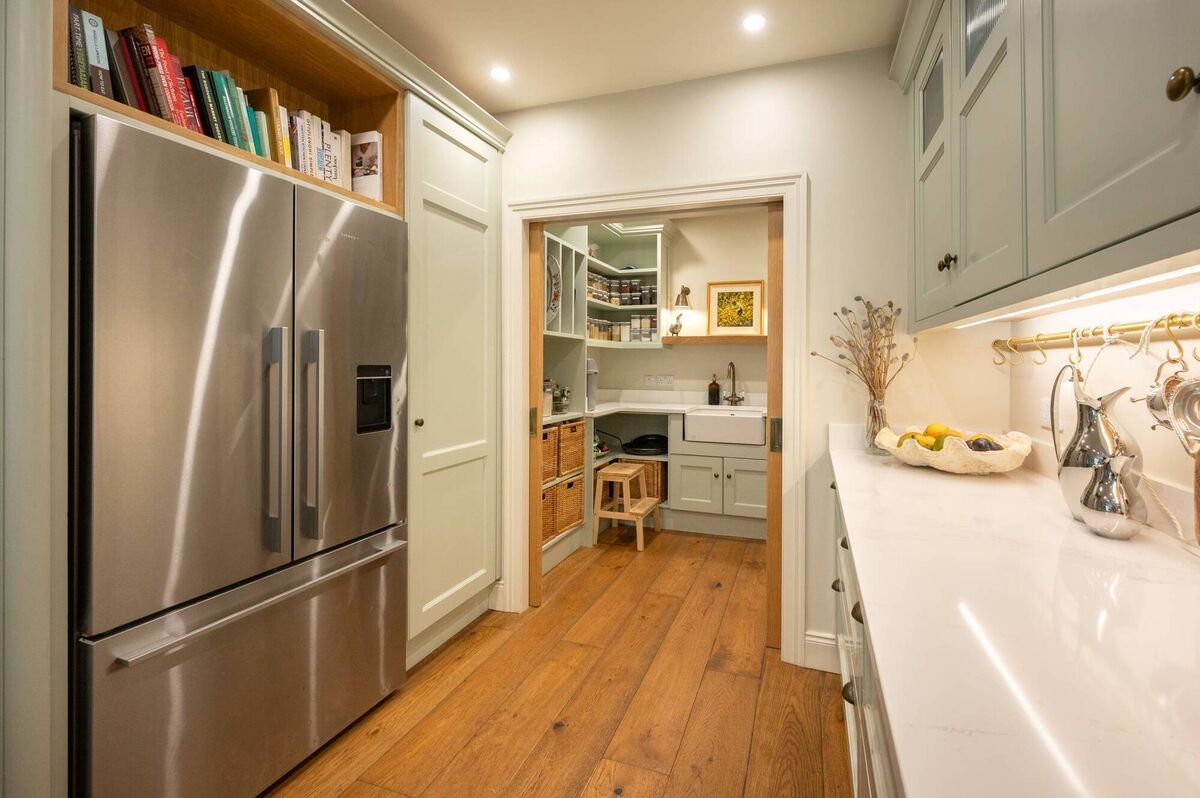 Pantry with pocket doors drawn back