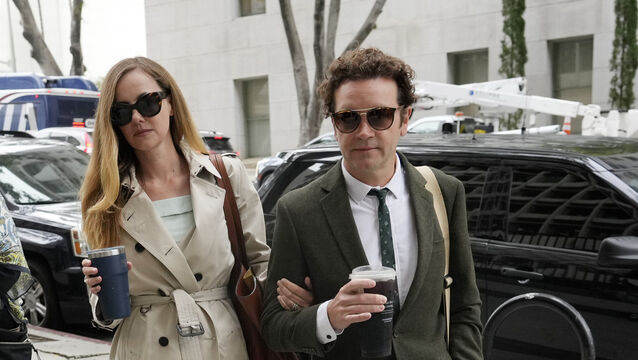 Danny Masterson and his wife Bijou Phillips arrive at court (Chris Pizzello/AP/PA)