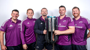 <p>BRAINS TRUST: Munster backroom staff, George Murray, Mike Prendergast, head coach Graham Rowntree, Denis Leamy and Andy Kyriacou with the URC Trophy. Picture: INPHO/James Crombie</p>