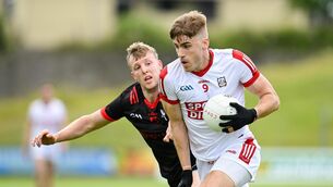 <p>LEADER: Ian Maguire of Cork in action against Paul Mathews of Louth during the GAA Football All-Ireland Senior Championship Round 1 match between Louth and Cork at Páirc Tailteann in Navan, Meath. Pic: Seb Daly/Sportsfile</p>